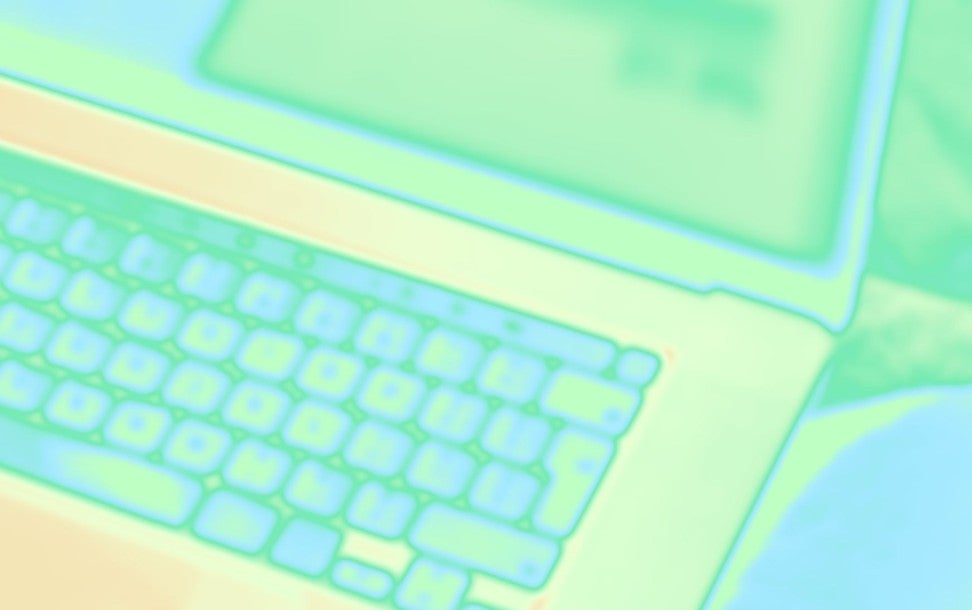 Blue and yellow stylized image of a laptop running Office apps