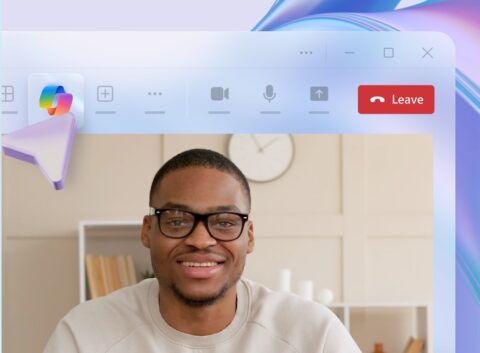 Copilot Chat image in background with a smiling employee in foreground
