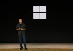 Satya Nadella standing on the Build 2026 stage in front of a Windows logo