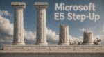 four pillars in front of a blue sky with clouds